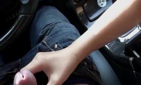 An Asian brunette teen blows in her car and fingered herself