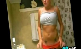 A tattooed blonde teasing herself in the bathroom - Camg8
