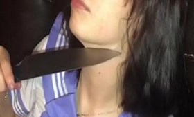 Cute young teen uses knife to fuck herself