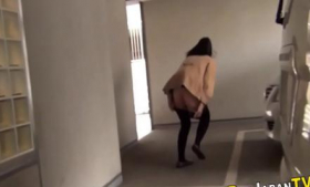 A sneaky Asian urinating