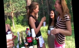 College girls erotically wash cars at a picnic in topless outfits