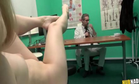 Patient Misha Cross sits waiting for the doctor with a slutty expression