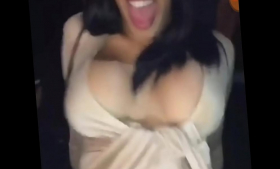 In this clip, Cardi B flashes her nude boobs upskirt