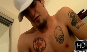 Masturbating a sexy tattooed stud with tattoos