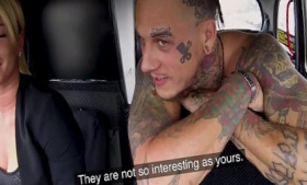 Tattooed sexy woman drives fake taxi and makes horny blonde nervous