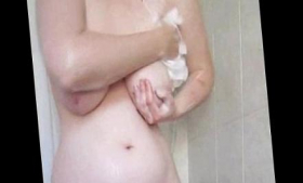 In the shower, she is big and titted