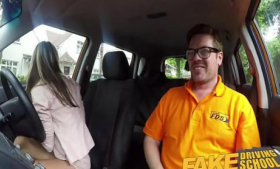 A hot Russian blonde fucked to orgasm in a fake driving school