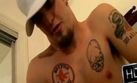 The sexy tattooed stud is masturbating