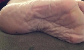 A pair of sexy wrinkled soles worn by Carmen
