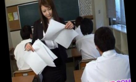 In an office suit, Asian busty Mei Sawai gives school kids a hot blowjob