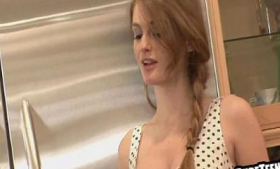 She's a redhead teen hottie sucking on a cock.
