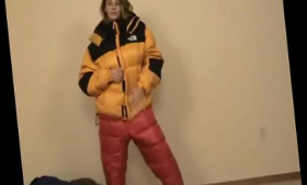 A puffy jacket and pants are worn by Brittany Lynn