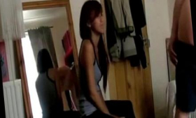 An Asian girlfriend is getting fucked from behind while on a fitness ball