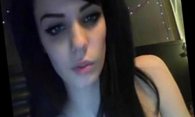 This gorgeous tattooed brunette is masticating for webcams