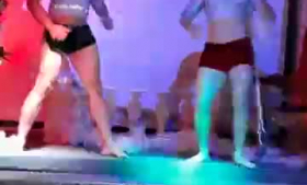 Two horny dancers titty fucks male stripper