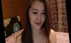 Watch a seductive young Asian girl in a live pornographic show for free