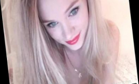 An adorable blonde girl is live on camera