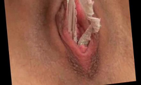An amateur stuffs her pantyhose inside her vaginal canal